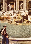 My father and I at the Trevi Fountain in Rome.
